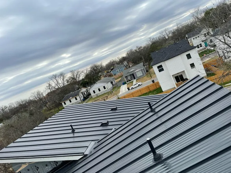 Standing seam metal roof panels with vents for Skylight Repair in Goffstown